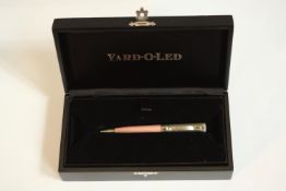 A boxed contemporary silver and enamel Yard O Led propelling pencil. H.5 W.18 D.10cm. (box)