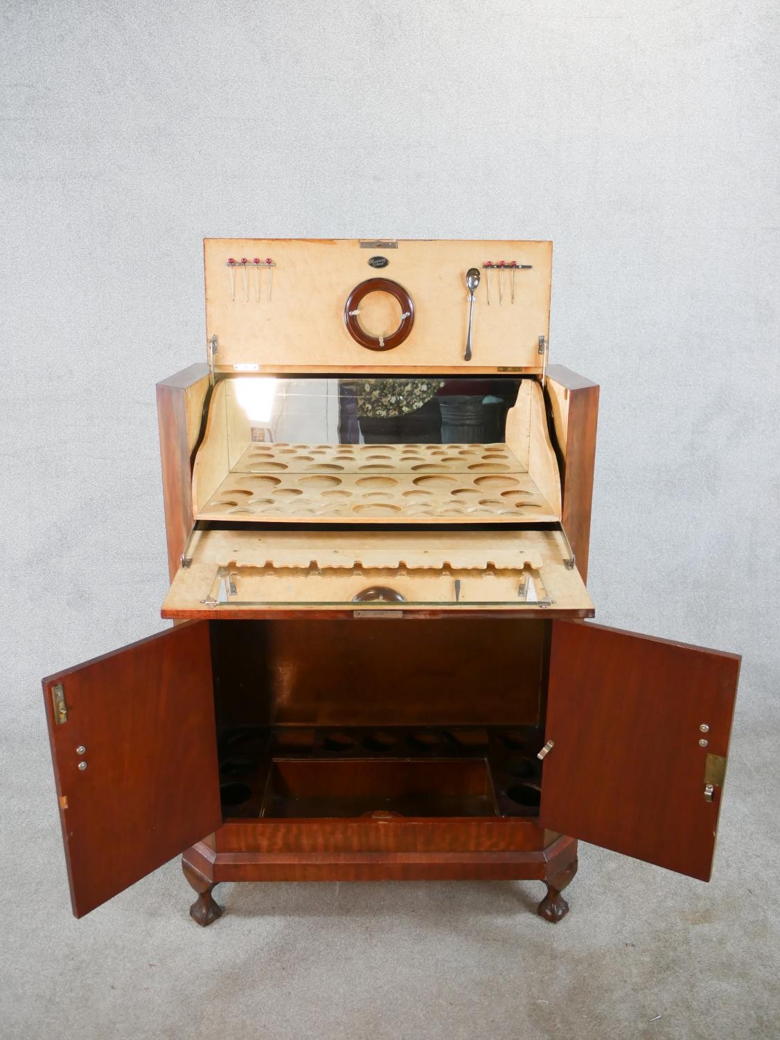 A 1930s walnut veneered drinks cabinet, the hinged lid opening to reveal fitted interior, with - Image 7 of 9