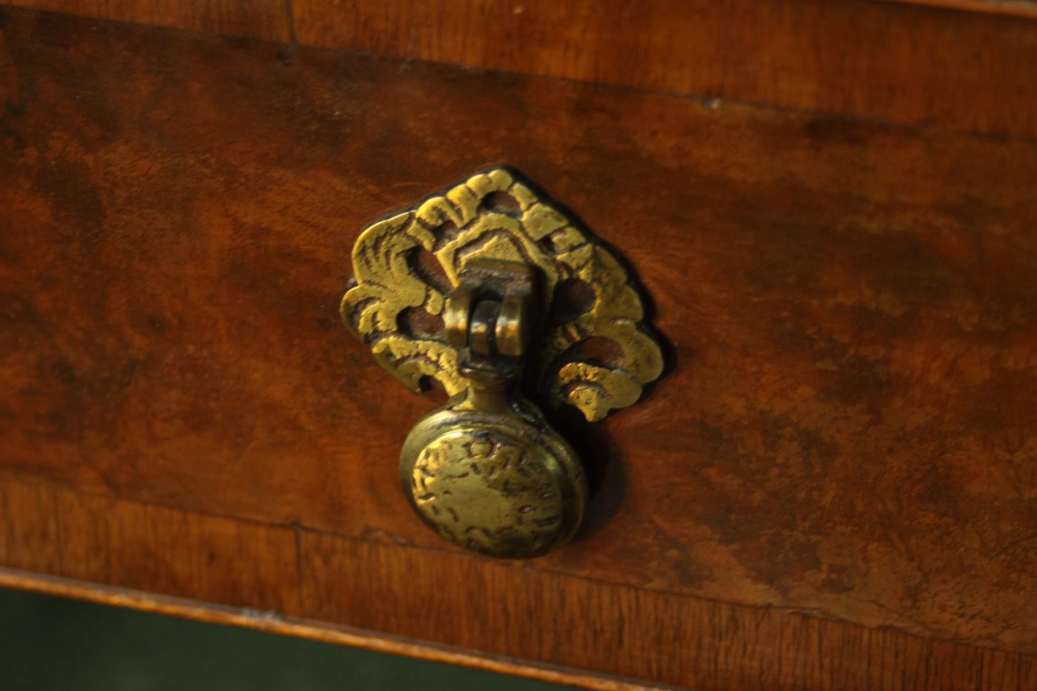 A 20th century walnut veneered chest of four graduating drawers, with brass swing handles, raised on - Image 7 of 9