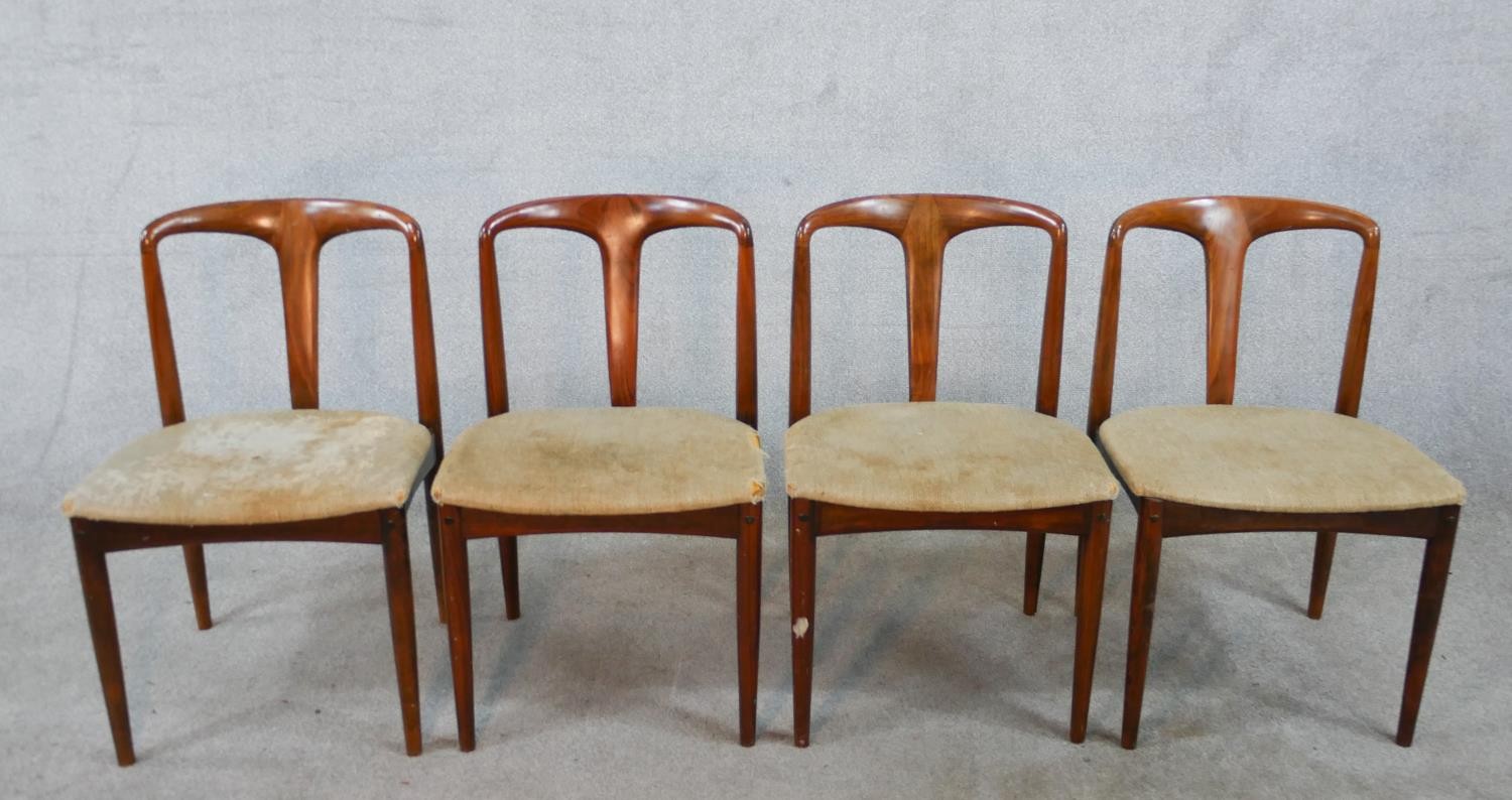 A set of four Johannes Andersen (Danish) model 94 Rosewood framed dining chairs, with upholstered