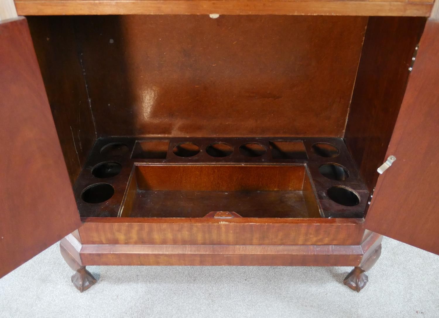 A 1930s walnut veneered drinks cabinet, the hinged lid opening to reveal fitted interior, with - Image 8 of 9