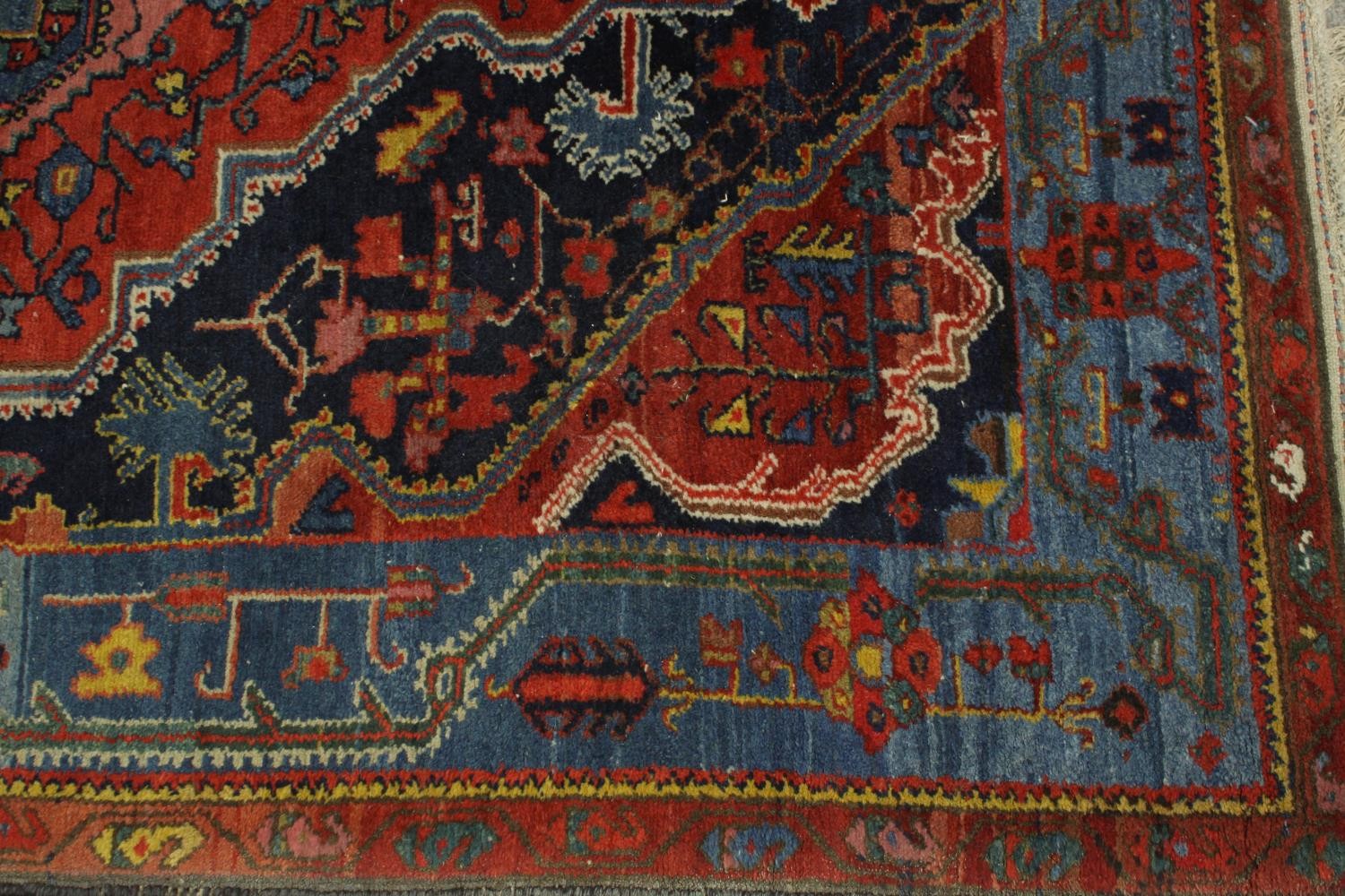 A red ground Persian Zanjan woollen rug, with all over geometric pattern. L.195 W.125cm. - Image 6 of 7