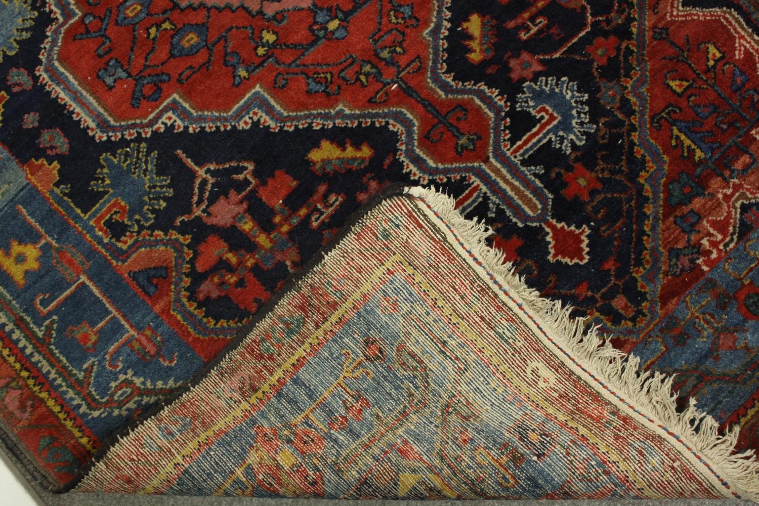 A red ground Persian Zanjan woollen rug, with all over geometric pattern. L.195 W.125cm. - Image 7 of 7