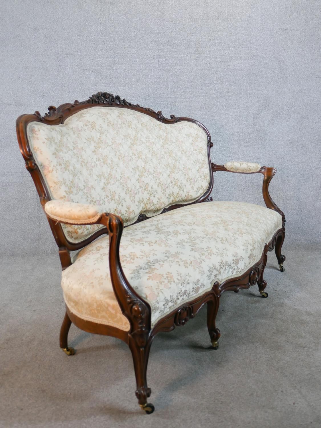 A 20th century French carved mahogany framed open arm settee, upholstered in cream fabric, raised on - Image 7 of 7