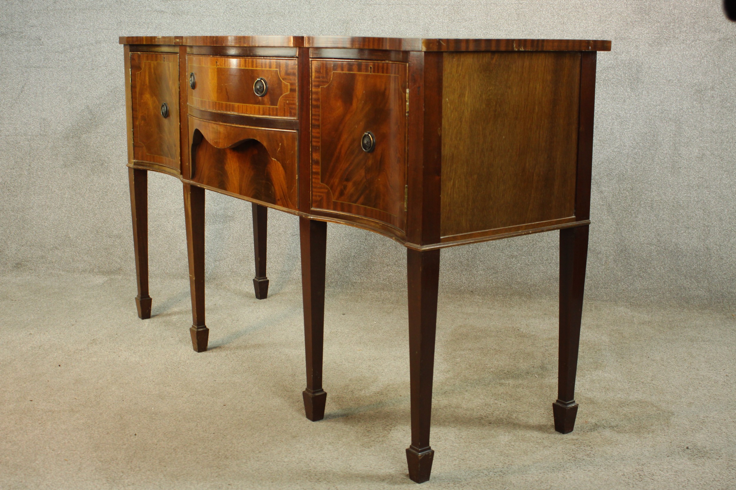 A Regency style mahogany serpentine fronted sideboard, with two central doors flanking two door - Image 3 of 12