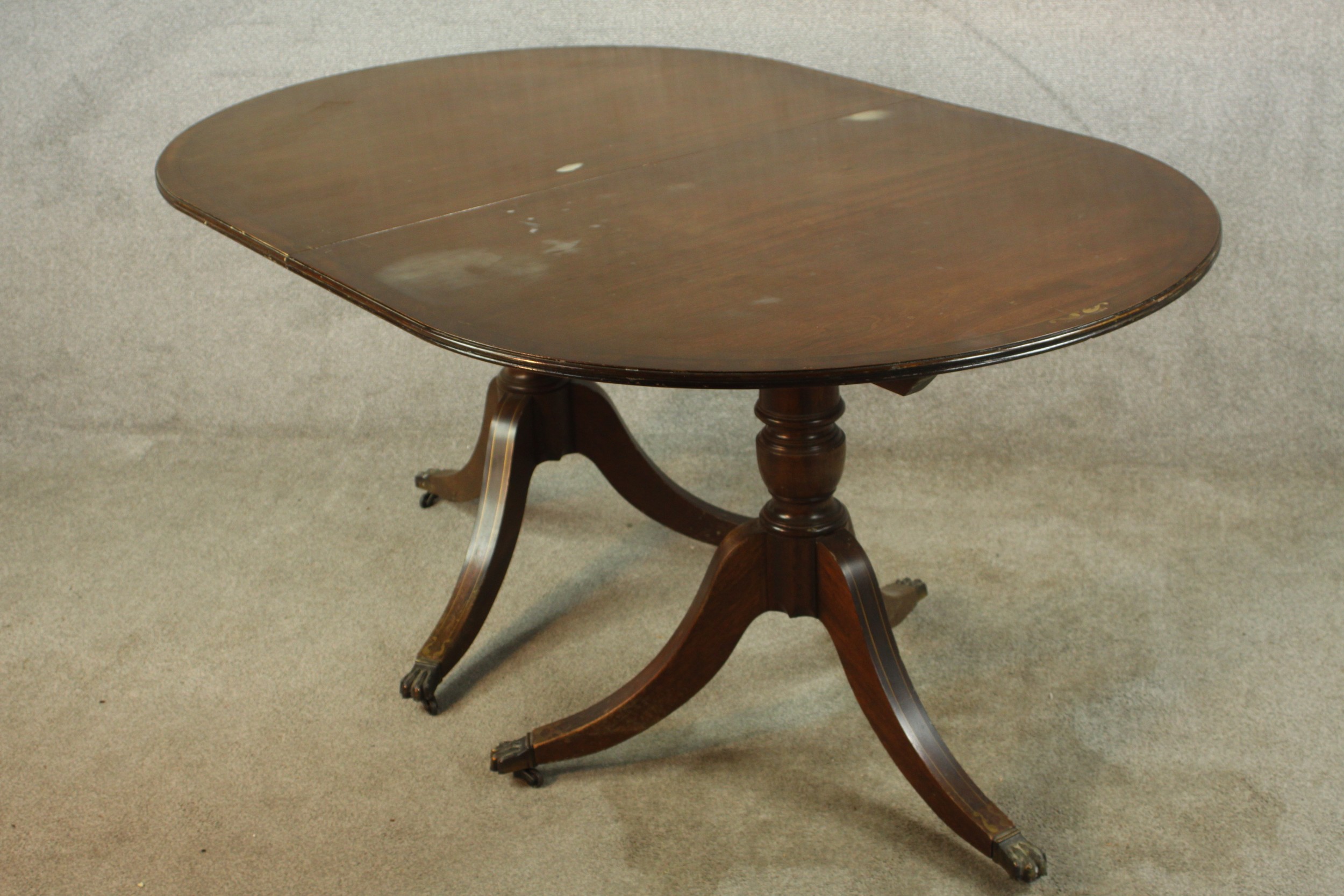 A 20th century Regency style mahogany twin pedestal dining table, raised on turned columns on tripod - Image 5 of 9