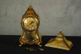 A 20th century Le Castel Swiss lacquered green and gold bracket clock, with brass pendulum and key