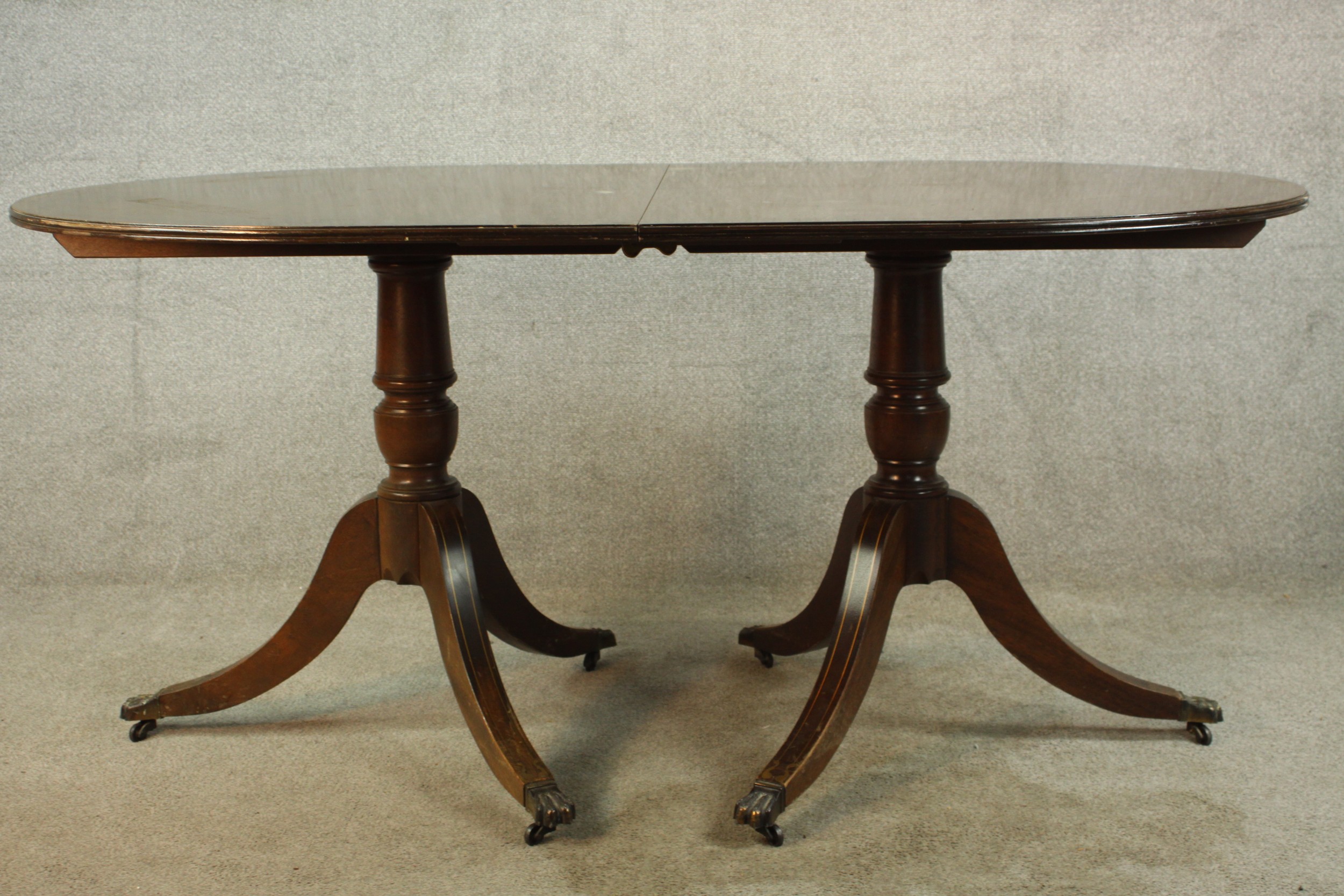 A 20th century Regency style mahogany twin pedestal dining table, raised on turned columns on tripod - Image 6 of 9