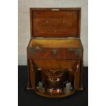 An early 20th century oak and silver plated mounted twin handled smokers cabinet, with hinged lid