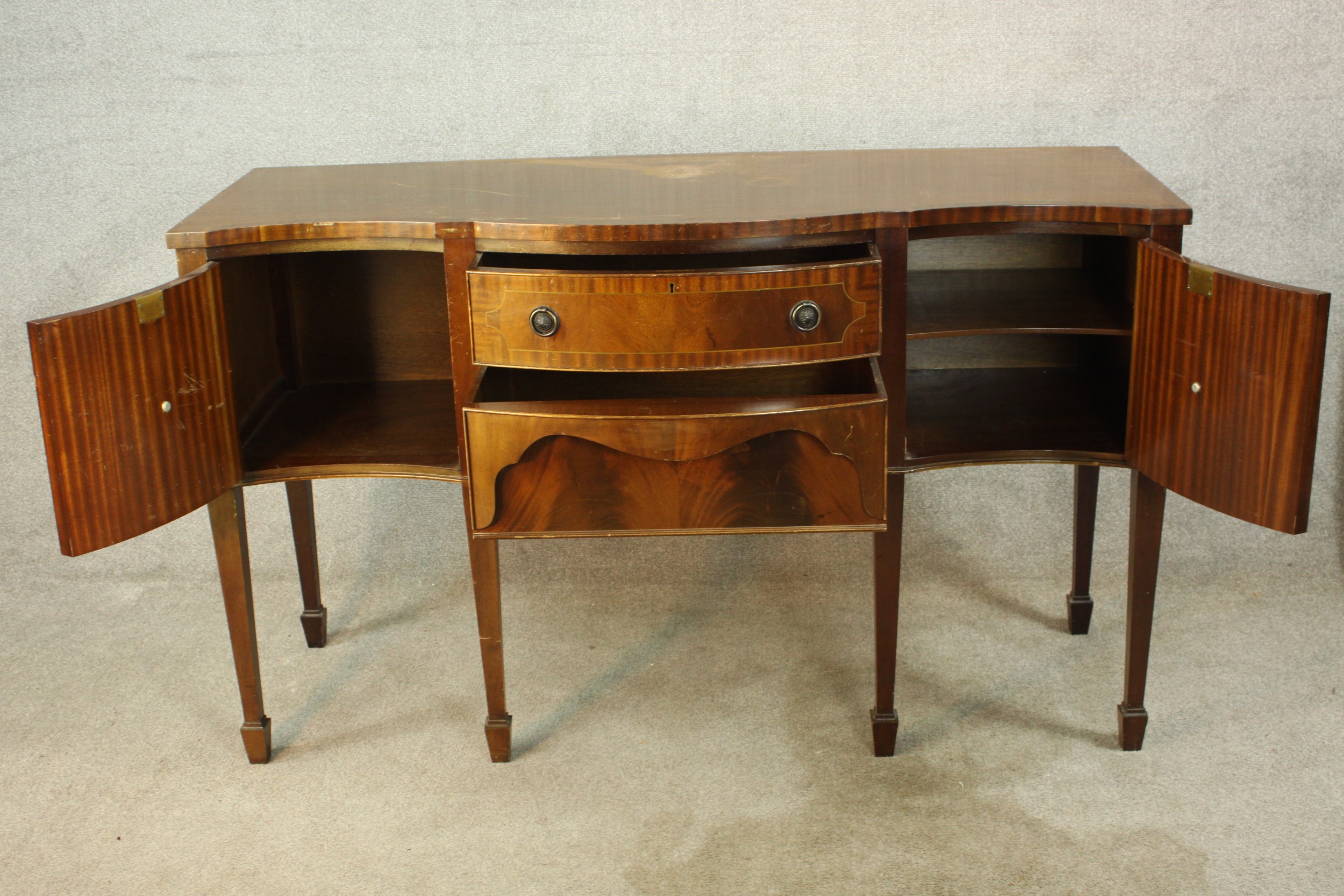 A Regency style mahogany serpentine fronted sideboard, with two central doors flanking two door - Image 5 of 12