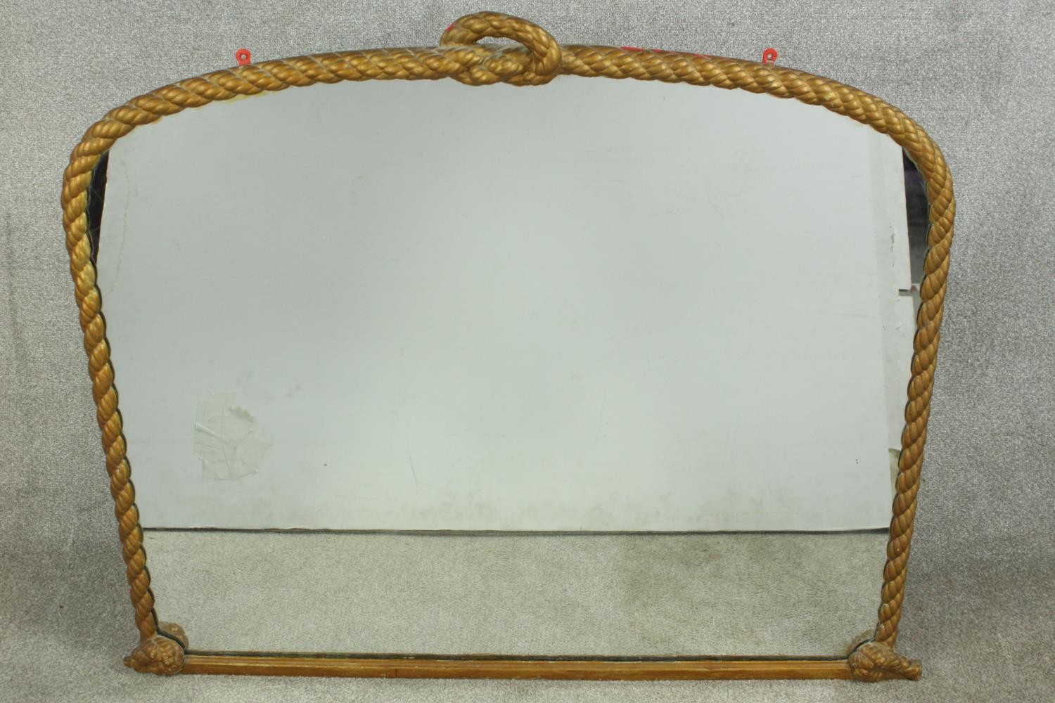 A 19th century gilt framed over mantle mirror, with rope twist style decoration. H.102 W.115cm.