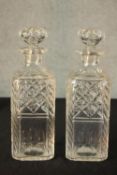 A pair of early 20th century cut glass rectangular decanters with mushroom shaped stoppers. H.27 W.9