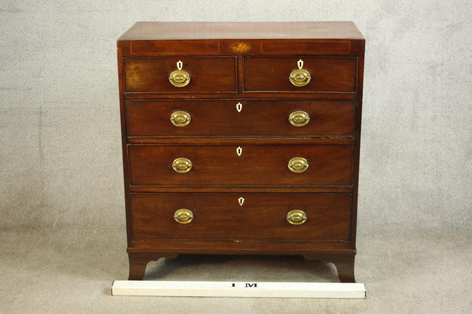 A Georgian inlaid mahogany chest of two short over three graduating drawers, raised on shaped - Image 2 of 8