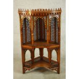 A set of 20th century bone inlaid hardwood, probably from Rajasthan, corner open hanging shelves.