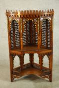 A set of 20th century bone inlaid hardwood, probably from Rajasthan, corner open hanging shelves.