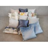 Sixteen various cushions to include five pairs. H.48 W.48cm (largest)
