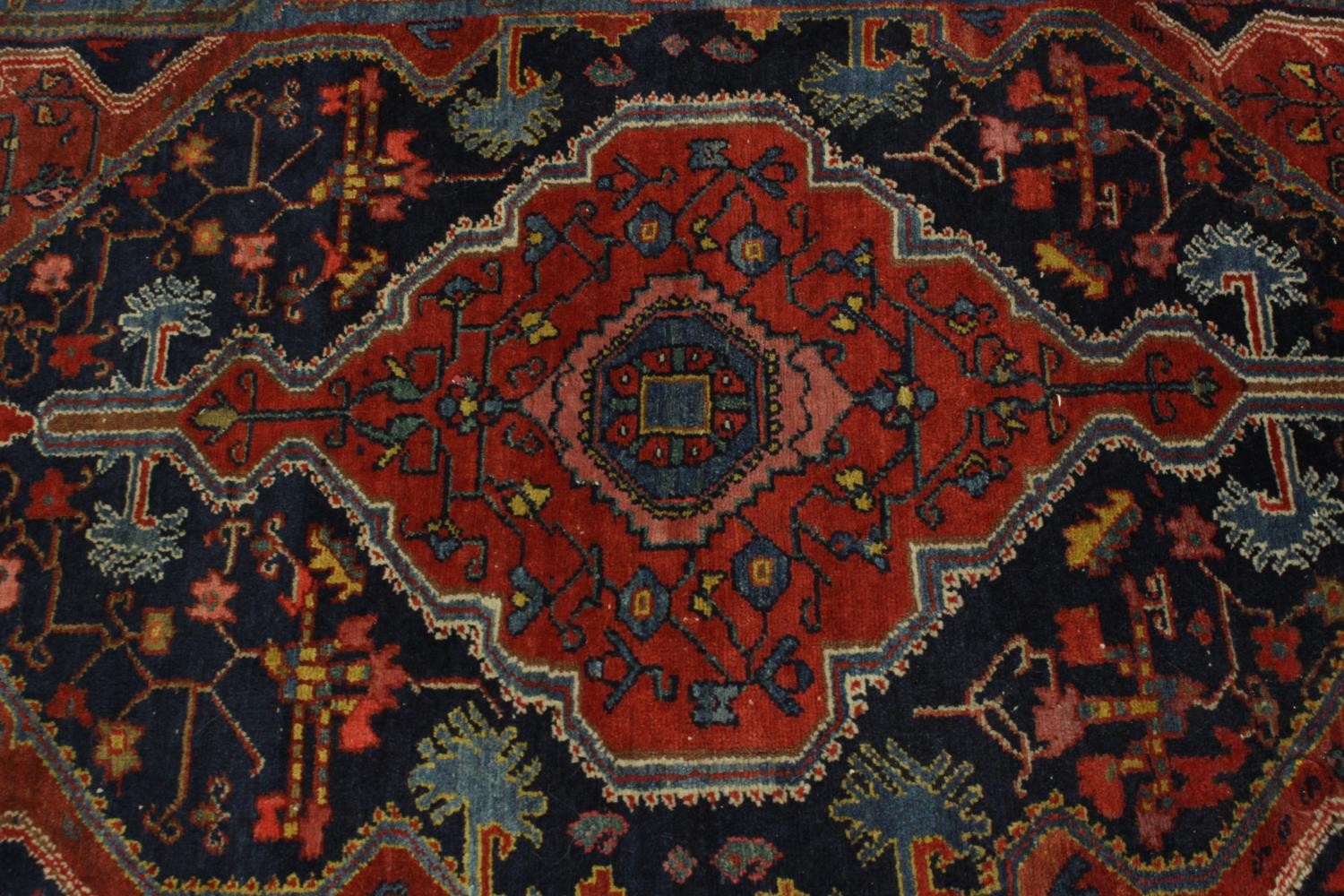 A red ground Persian Zanjan woollen rug, with all over geometric pattern. L.195 W.125cm. - Image 5 of 7