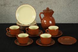 A 20th century Watcombe Torquay part coffee set, comprised of cups, saucers, plates and coffee