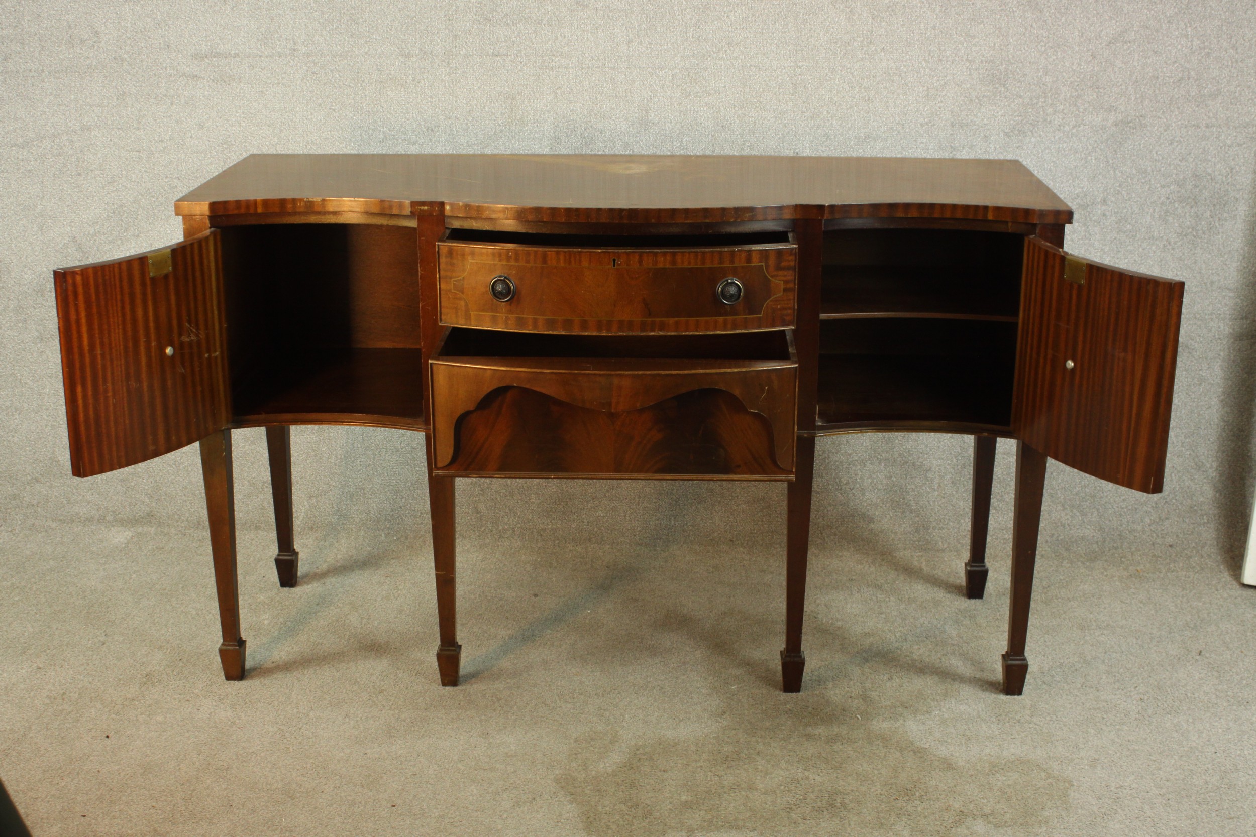 A Regency style mahogany serpentine fronted sideboard, with two central doors flanking two door - Image 4 of 12