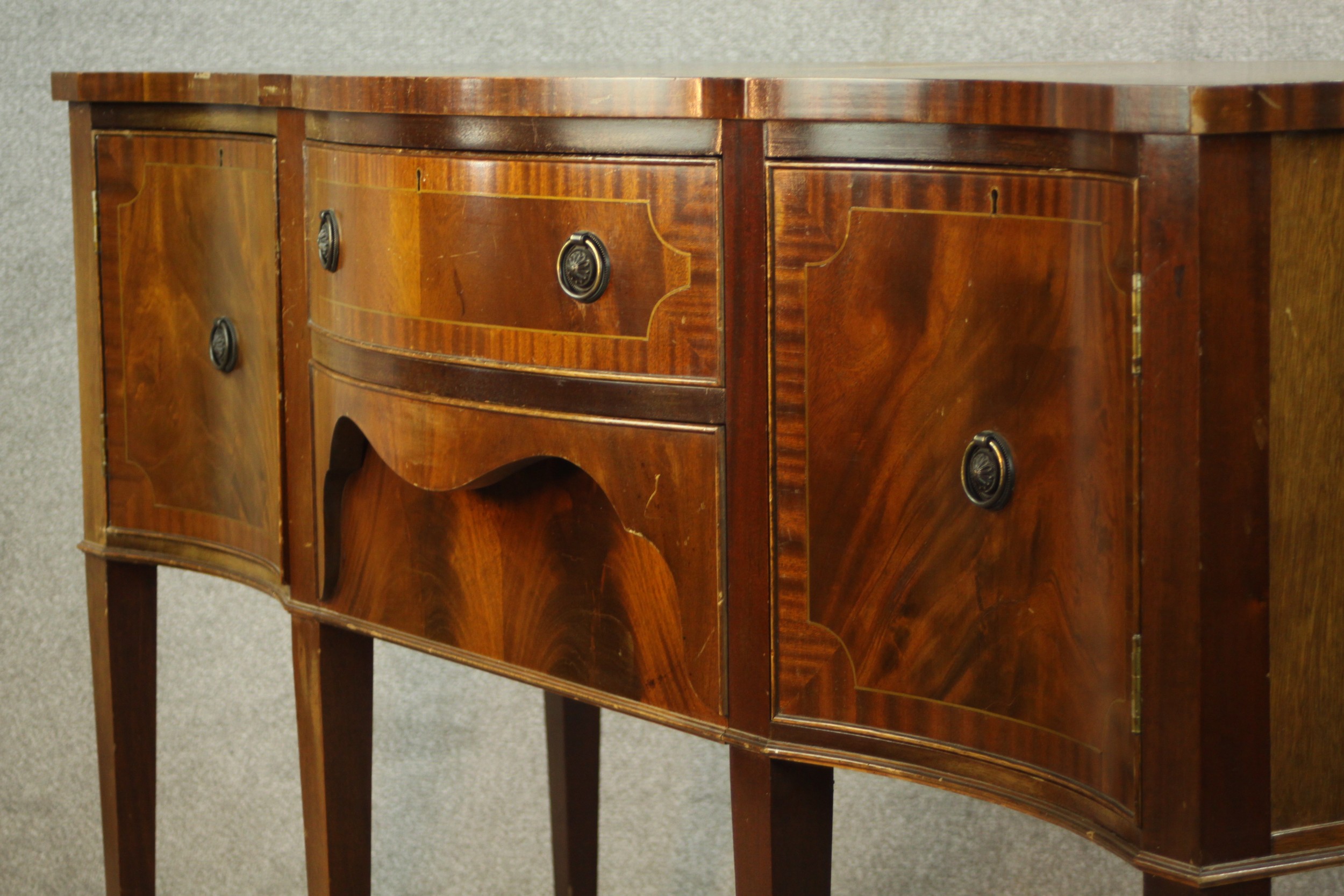 A Regency style mahogany serpentine fronted sideboard, with two central doors flanking two door - Image 8 of 12