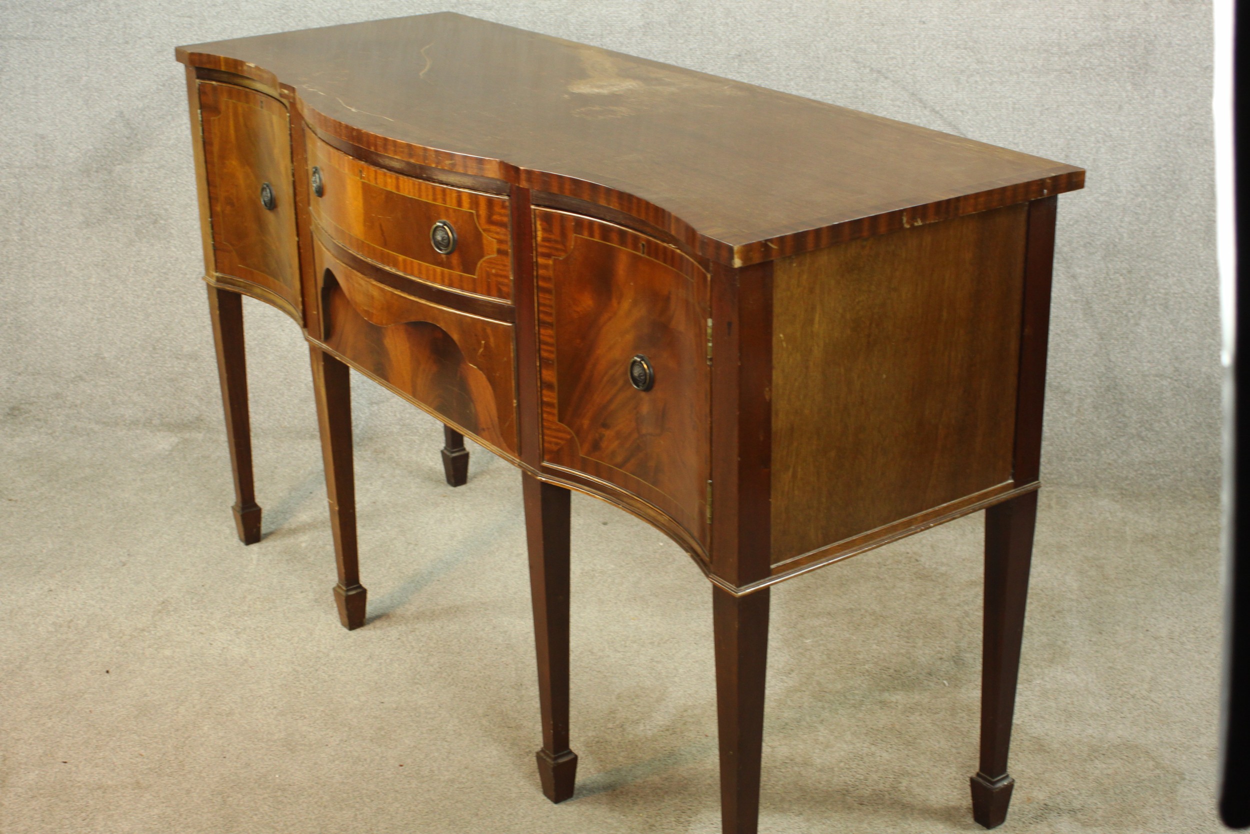 A Regency style mahogany serpentine fronted sideboard, with two central doors flanking two door - Image 7 of 12