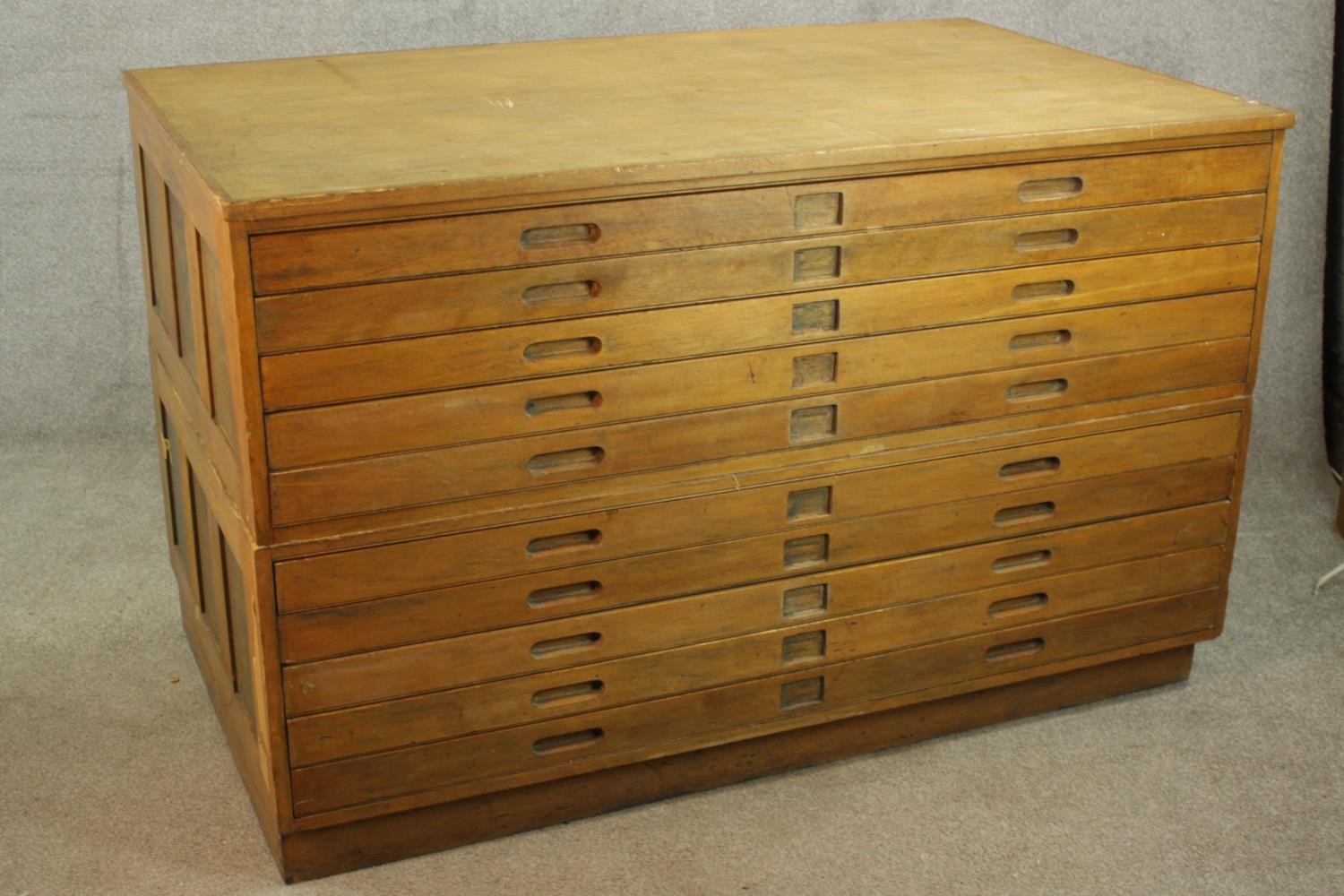 An early 20th century beech ten drawer plan chest, each with incised handles. H.92 W.148 D.90cm. - Image 7 of 8