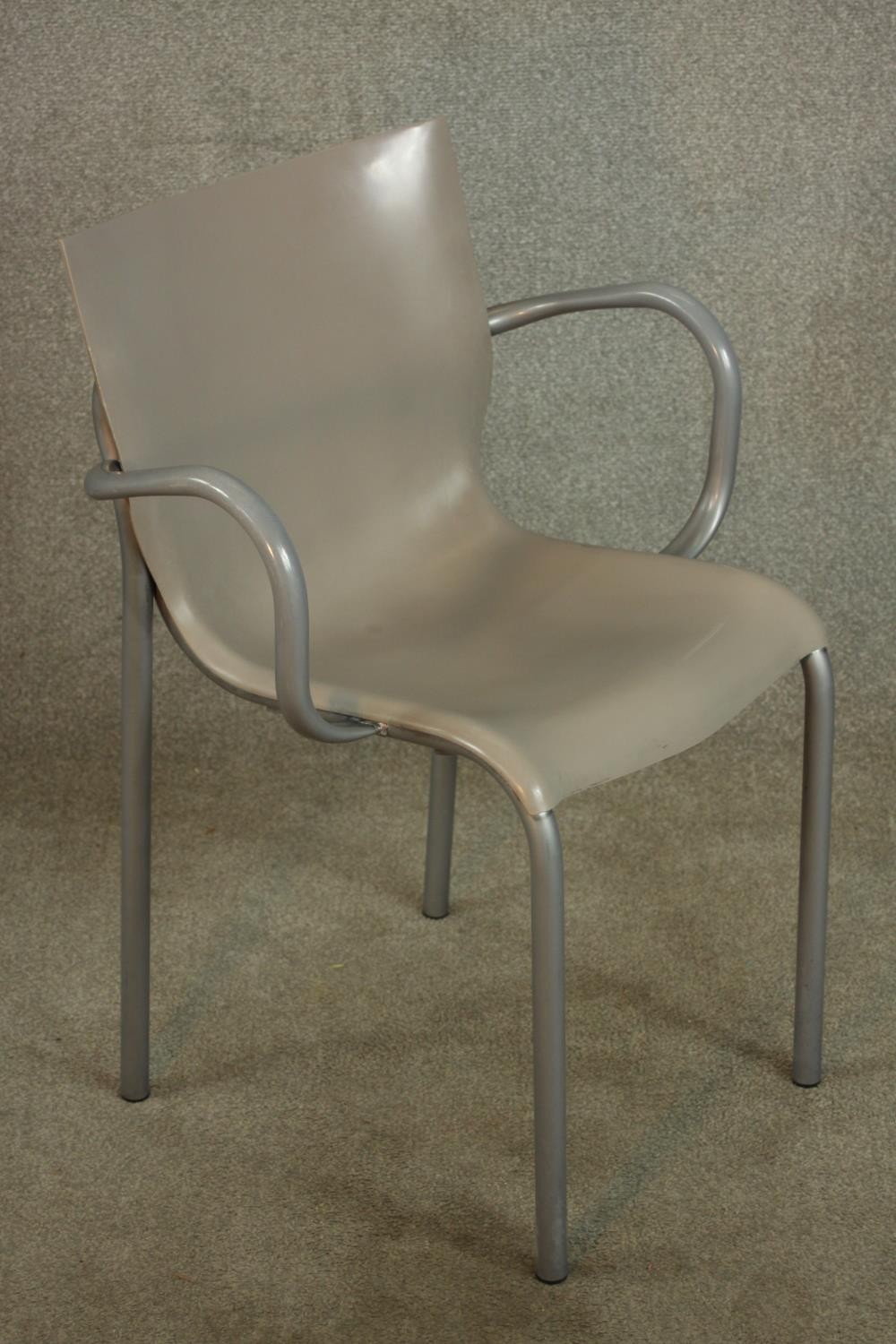 A mid 20th century leather and brushed steel open armchair, raised on straight supports. - Image 2 of 5