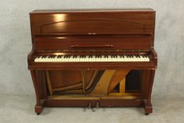 A 20th century mahogany Firth Bros Pianos of Edmonton upright piano. H.114 W.134 D.54cm.