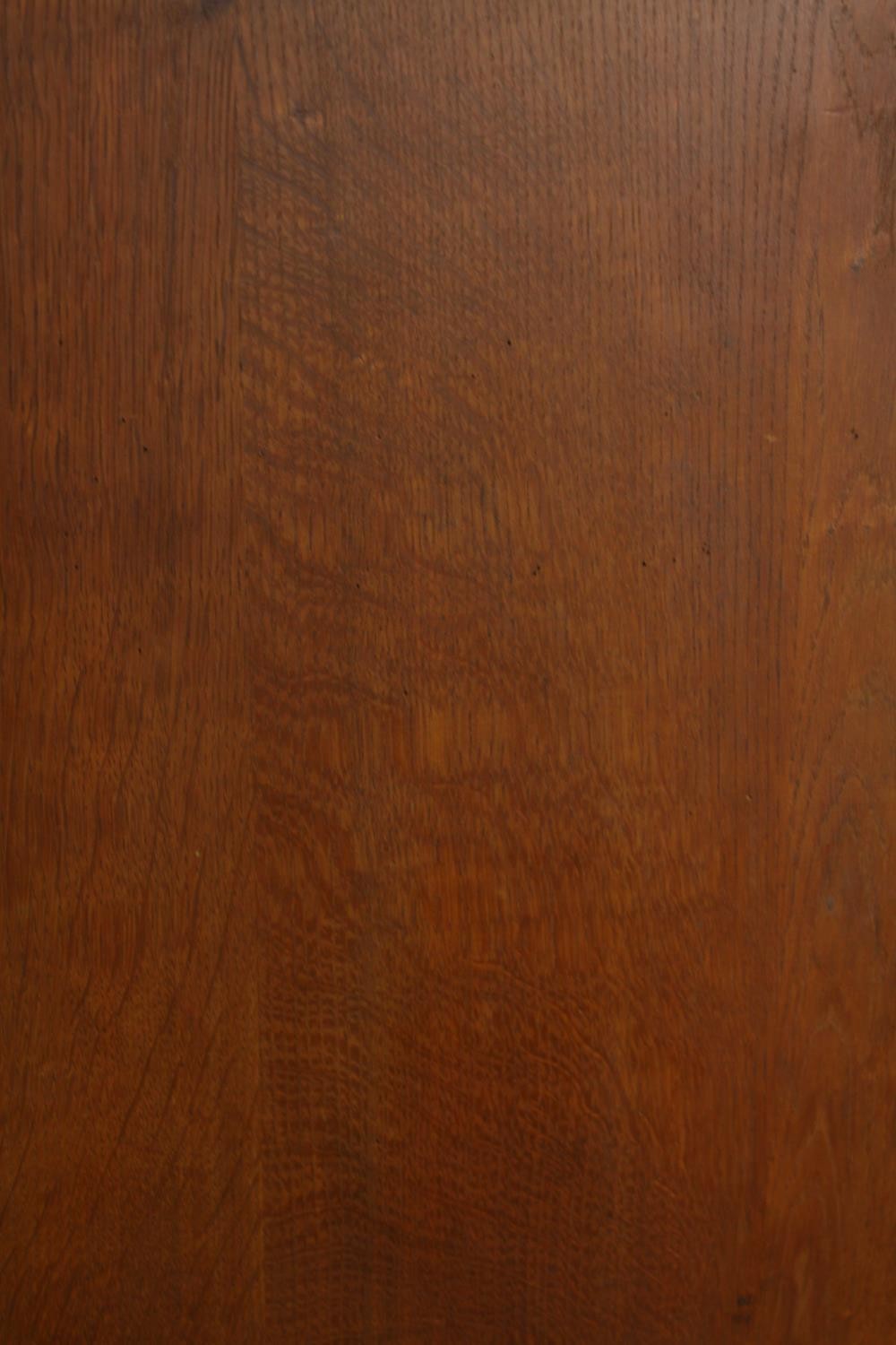 A late 19th century oak two door cupboard with two drawers below, raised on heavily carved - Image 8 of 10