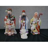 Three Chinese polychrome porcelain Immortal figures, together a Chinese Blanc de Chine porcelain