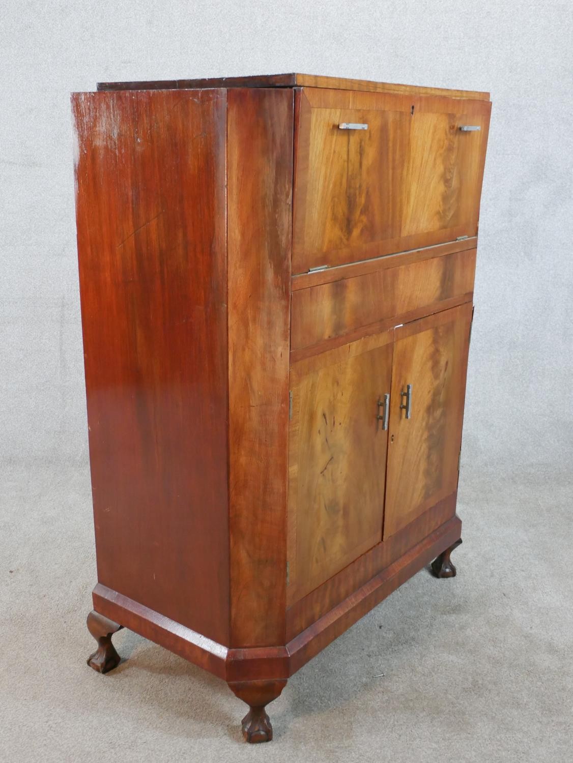 A 1930s walnut veneered drinks cabinet, the hinged lid opening to reveal fitted interior, with - Image 9 of 9