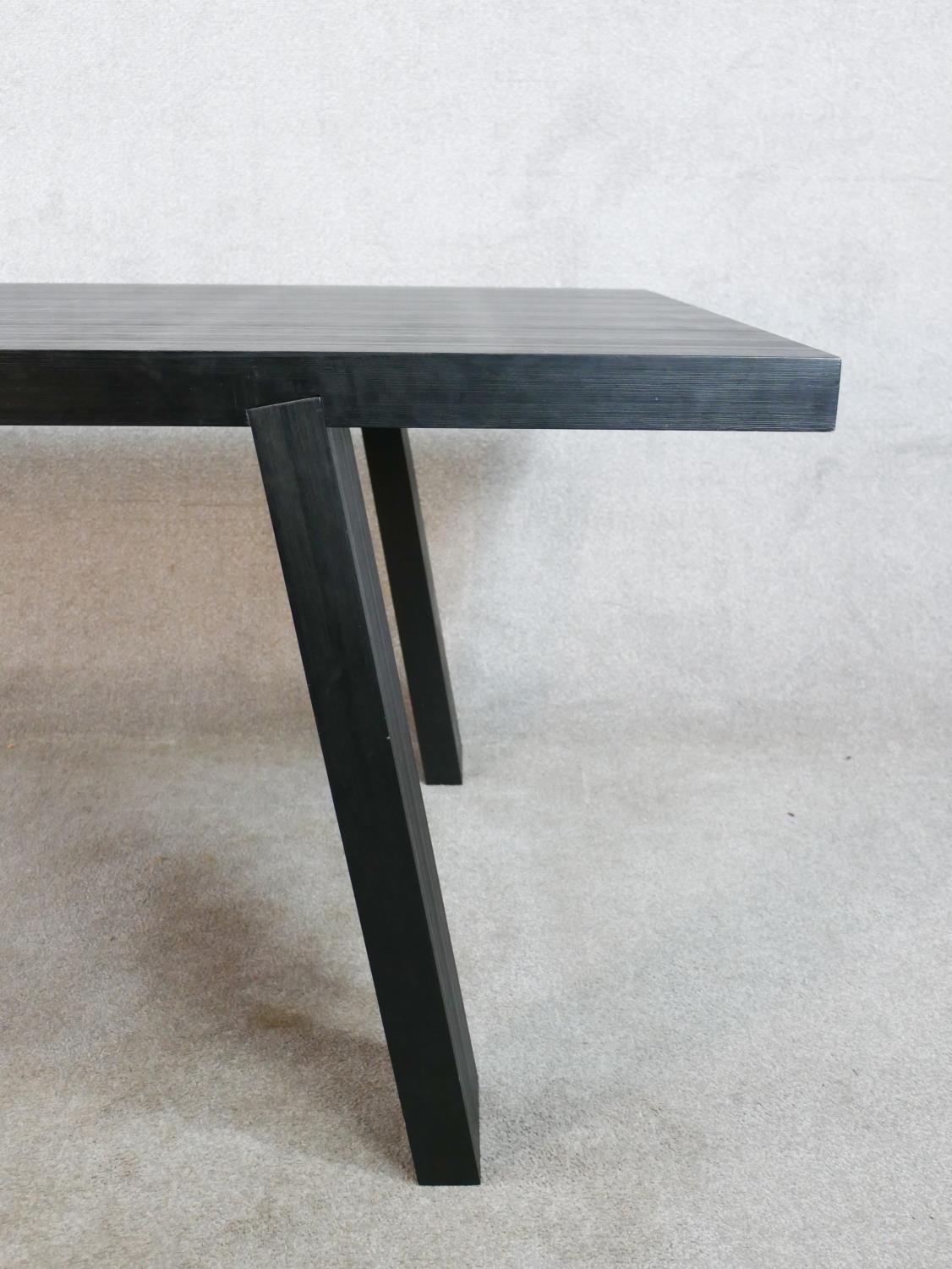 A contemporary black painted Porro table, raised on splayed plank legs, with original label. H.70 - Image 2 of 6