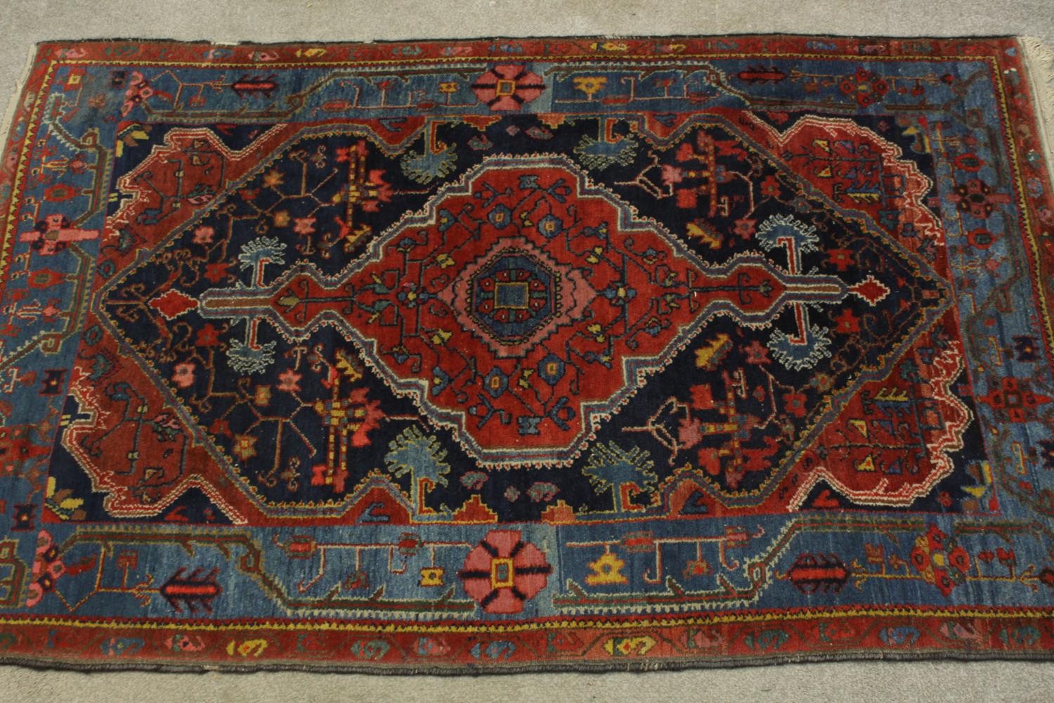 A red ground Persian Zanjan woollen rug, with all over geometric pattern. L.195 W.125cm. - Image 3 of 7