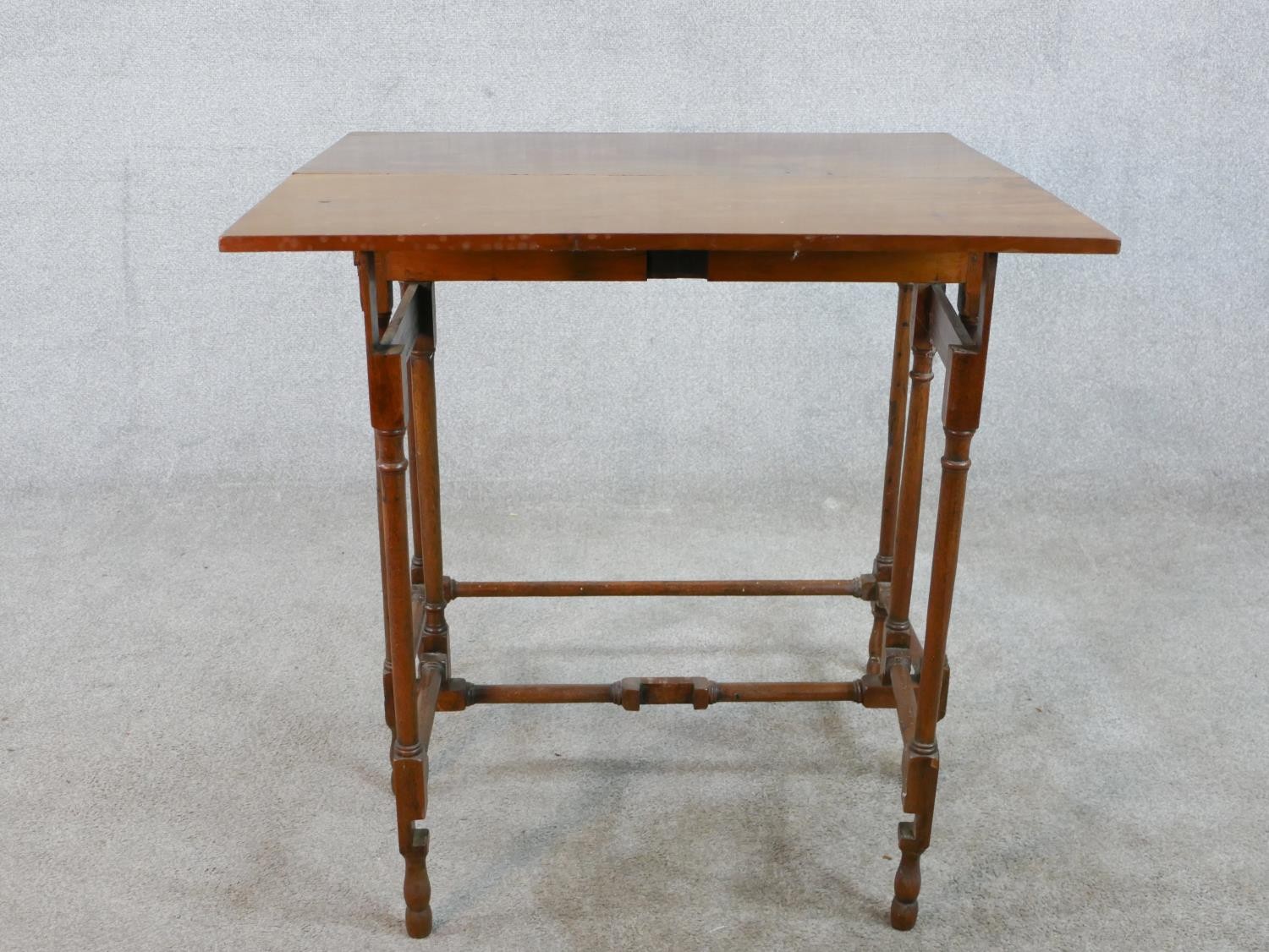 A 19th century mahogany drop leaf gate leg table raised on slender spider leg supports. H.71 W.71 - Image 3 of 5