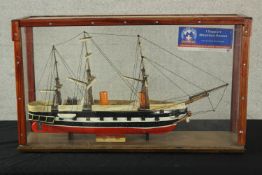 A cased scale model a three mast galleon boat, with brass plaque, Warrior 1861-1892.H.50 W.84 D.