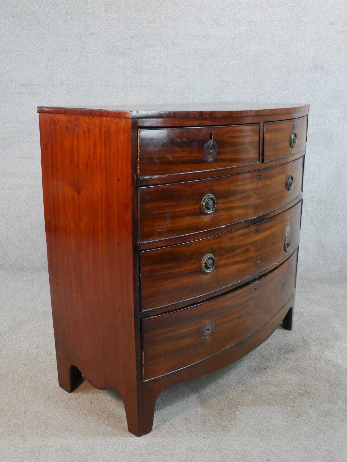A 19th century mahogany bow fronted chest of two short over three long drawers, raised on shaped - Image 6 of 7