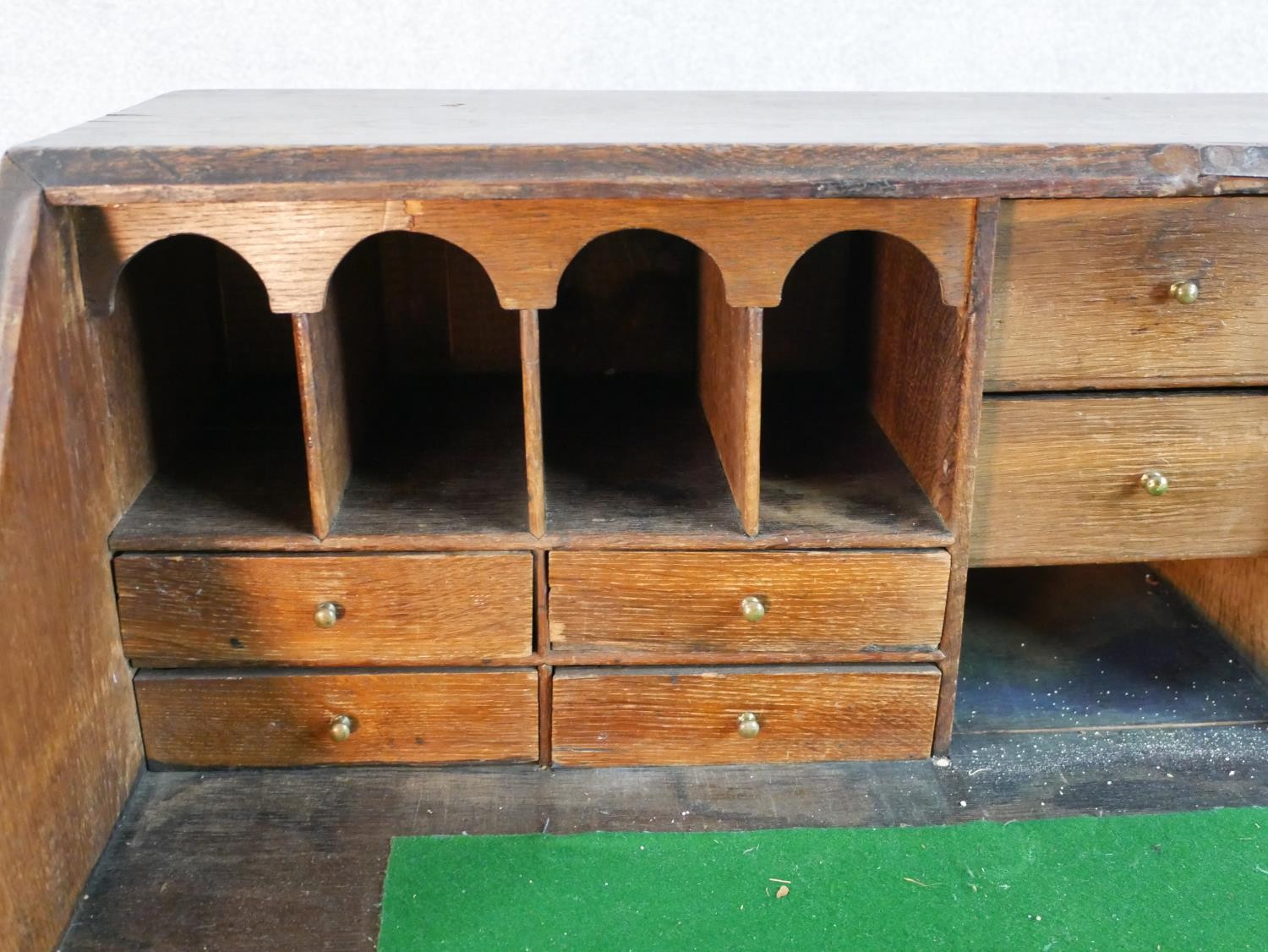A 19th century oak fall front bureau, the fall front opening to reveal fitted interior, above - Image 6 of 9