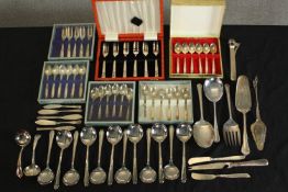 A large assortment of boxed and loose plated flatware. H.26 W.5cm. (largest)