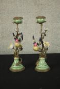 A pair of 20th century crackle glaze porcelain candlesticks, moulded with birds applied to the