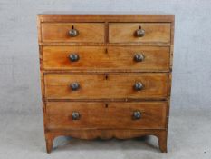 A 19th century mahogany chest of two short over three long drawers with turned knop ebonised