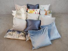 Sixteen various cushions to include five pairs. H.48 W.48cm (largest)