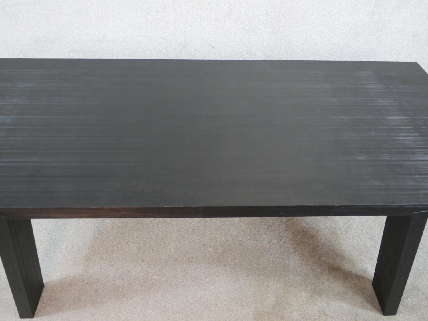 A contemporary black painted Porro table, raised on splayed plank legs, with original label. H.70 - Image 3 of 6