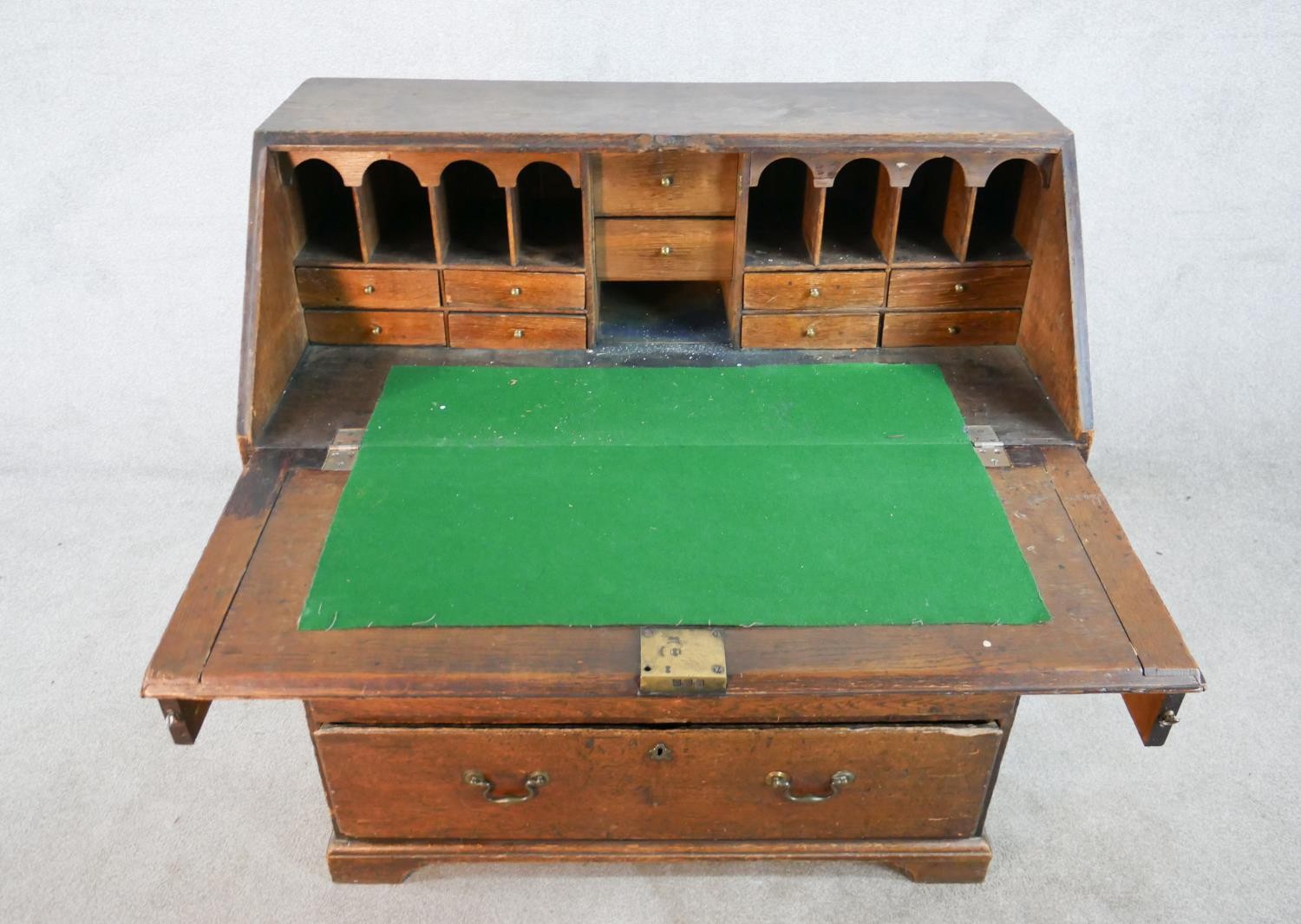 A 19th century oak fall front bureau, the fall front opening to reveal fitted interior, above - Image 5 of 9