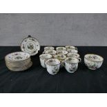 A 20th century Spode Peplow part tea set, retailed by Harrods, comprising of cups, saucers and sugar