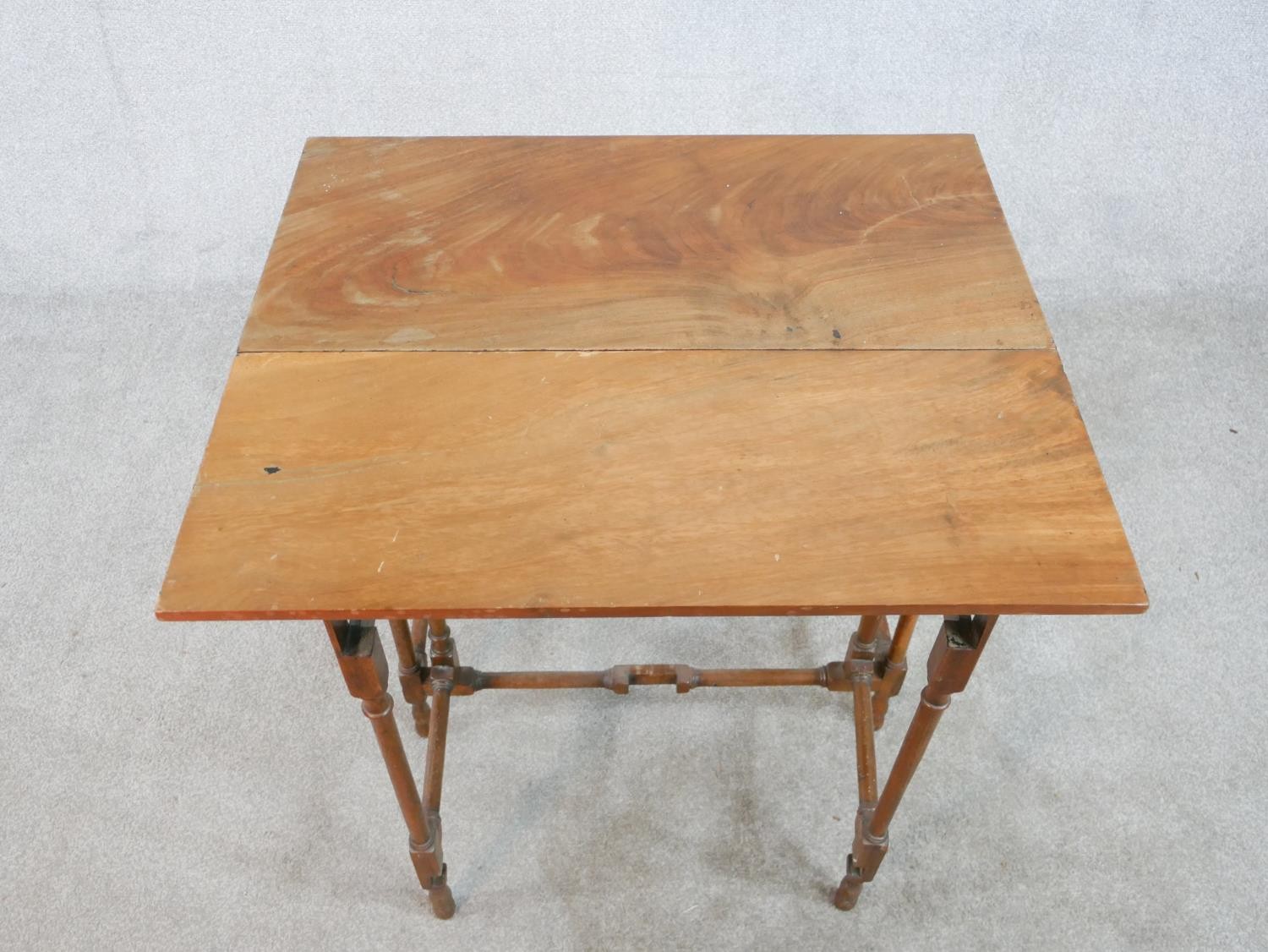 A 19th century mahogany drop leaf gate leg table raised on slender spider leg supports. H.71 W.71 - Image 4 of 5
