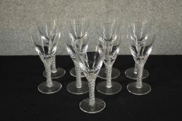 A set of nine clear glass air twist stem champagne glasses. H.17 Dia. 7cm. (each)