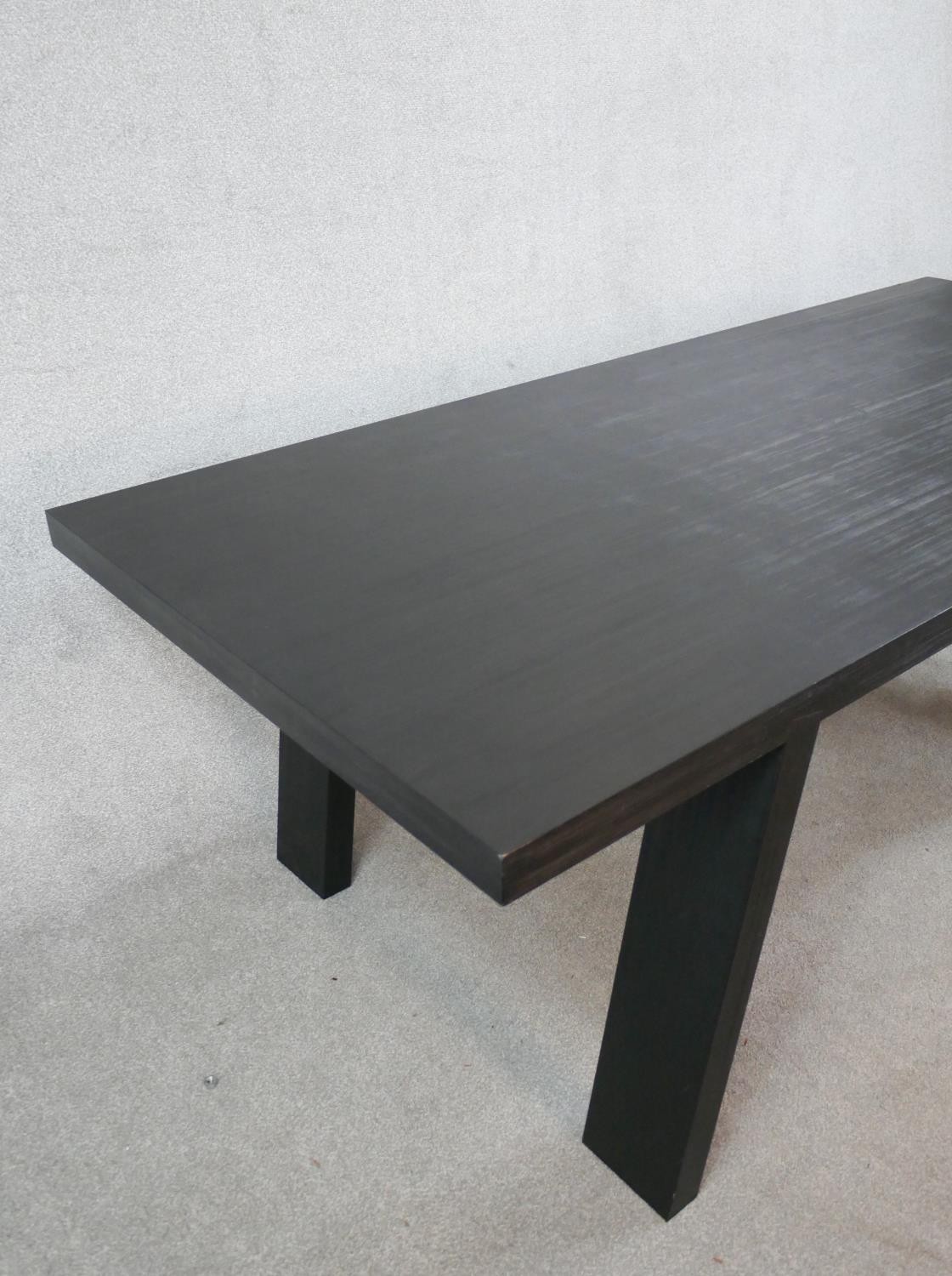 A contemporary black painted Porro table, raised on splayed plank legs, with original label. H.70 - Image 4 of 6