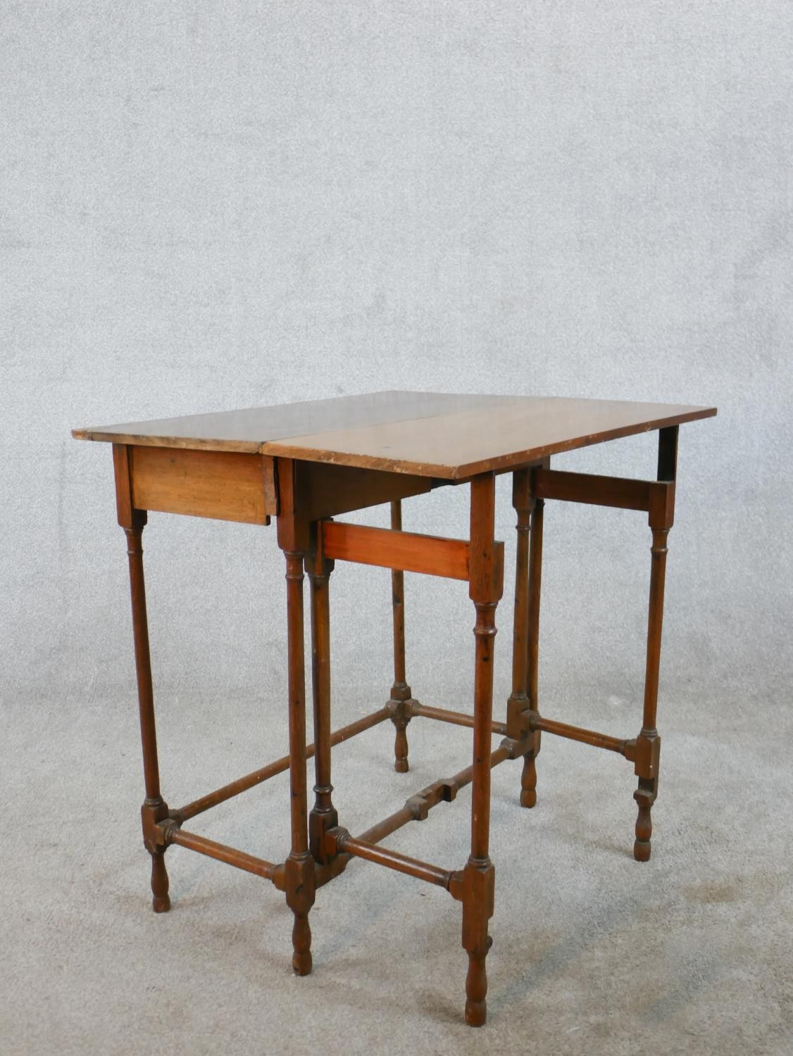 A 19th century mahogany drop leaf gate leg table raised on slender spider leg supports. H.71 W.71 - Image 5 of 5