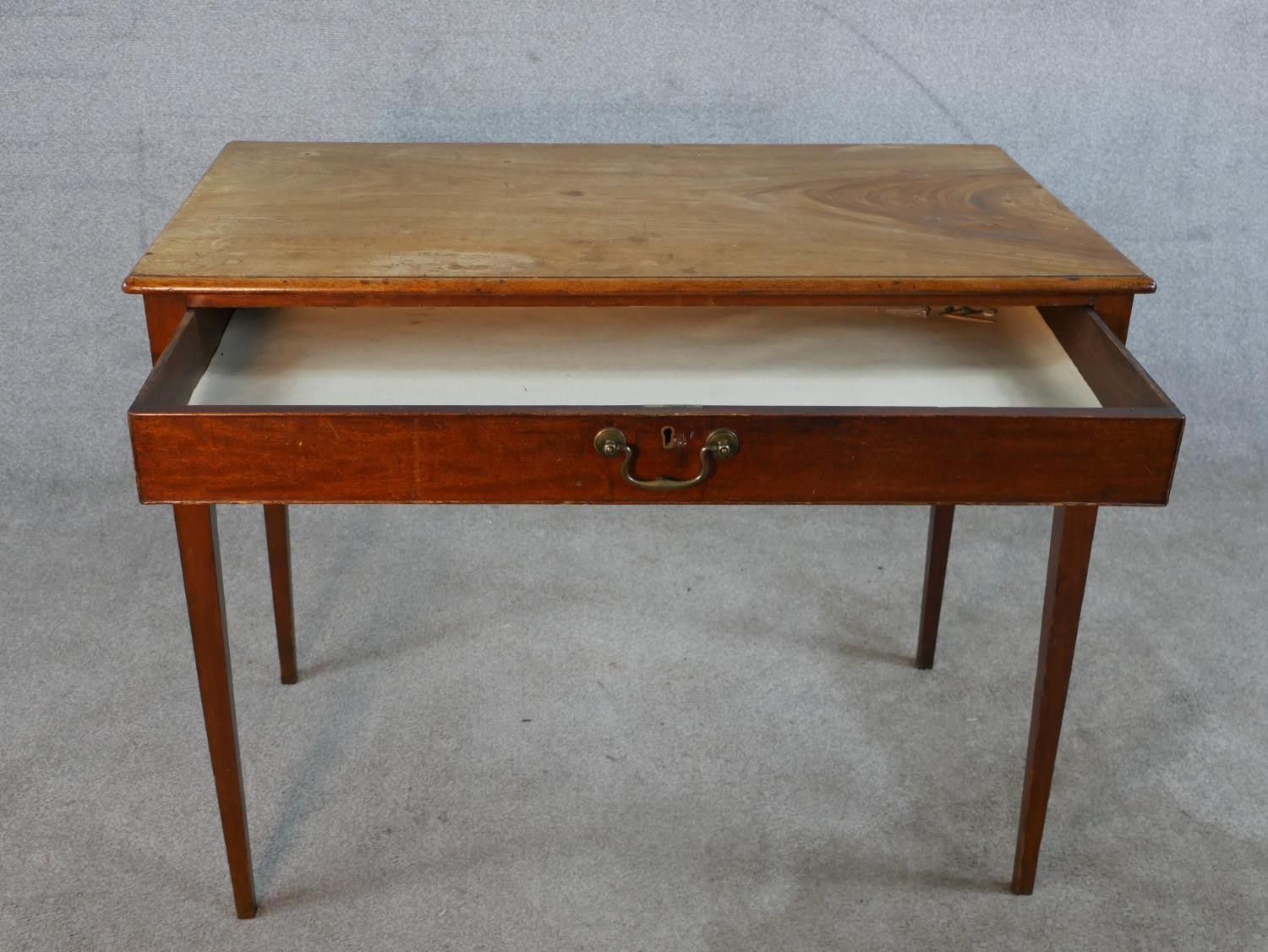A 19th century mahogany single drawer side table with brass swing handle, raised on square - Image 3 of 6