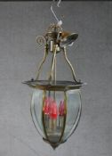 A 19th/early 20th century gilt brass and glass three branch hall lantern. H.52 W.27 D.27cm